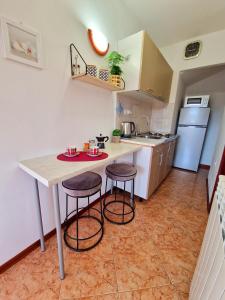 Kuchyň nebo kuchyňský kout v ubytování Apartmani Antonija