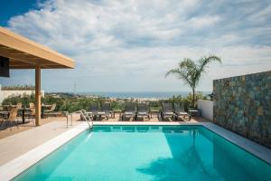 a swimming pool on the roof of a house at Casa Blu Boutique Hotel "by Checkin" Adults Only in Hersonissos