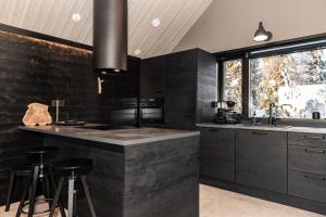 Η κουζίνα ή μικρή κουζίνα στο Villa Alppisyöte +23 φωτογραφίες