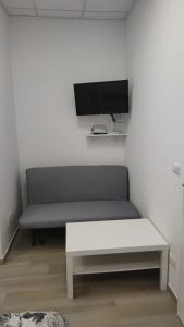 TV a/nebo společenská místnost v ubytování Giusvinci