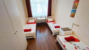 Postel nebo postele na pokoji v ubytování Happy Hotel