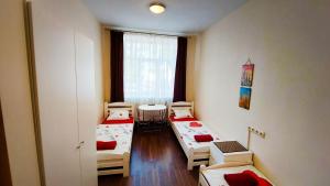 Postel nebo postele na pokoji v ubytování Happy Hotel