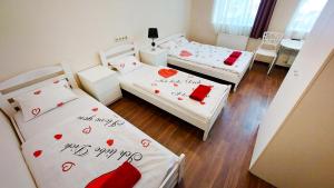Postel nebo postele na pokoji v ubytování Happy Hotel