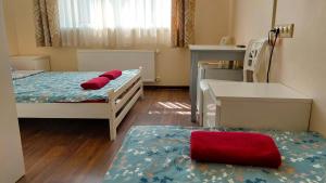 Postel nebo postele na pokoji v ubytování Happy Hotel