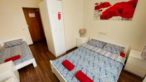Postel nebo postele na pokoji v ubytování Happy Hotel