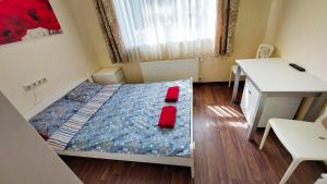 Postel nebo postele na pokoji v ubytování Happy Hotel