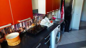 Kuchyň nebo kuchyňský kout v ubytování Happy Hotel
