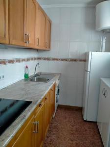 Kuchyň nebo kuchyňský kout v ubytování Superbe appartement avec piscine et terrasse VM43