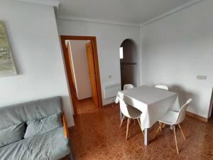 Posezení v ubytování Superbe appartement avec piscine et terrasse VM43