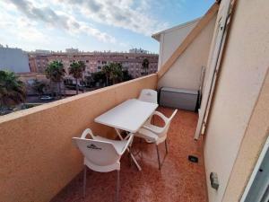 Balkón nebo terasa v ubytování Superbe appartement avec piscine et terrasse VM43