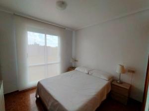 Postel nebo postele na pokoji v ubytování Superbe appartement avec piscine et terrasse VM43