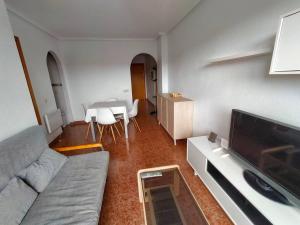 Posezení v ubytování Superbe appartement avec piscine et terrasse VM43