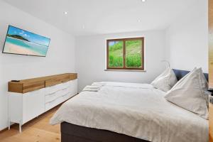 Postel nebo postele na pokoji v ubytování Luxus Chalet Moritz