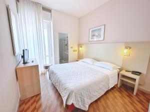 Postel nebo postele na pokoji v ubytování Aura Living Hotel + 37 fotografií