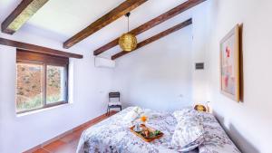 Postel nebo postele na pokoji v ubytování Cortijo Maravilla Frigiliana by Ruralidays