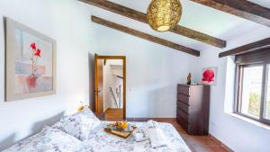 Postel nebo postele na pokoji v ubytování Cortijo Maravilla Frigiliana by Ruralidays