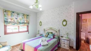 Posteľ alebo postele v izbe v ubytovaní Villa la Era Alhaurín el Grande by Ruralidays