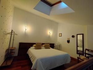 Postel nebo postele na pokoji v ubytování B&B Eguzkitza