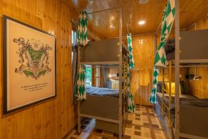 Postel nebo postele na pokoji v ubytování Whoopers Boutique Kasol