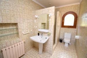 a bathroom with a sink and a toilet at Casa Vista Montgo Javea - 5048-1 in Balcon del Mar +35 photos