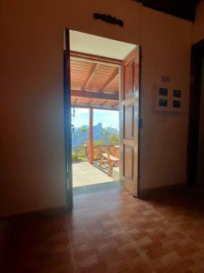 an open door with a view of a patio at Finca Ancestros in Tejeda