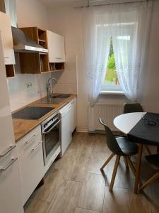 Kuchyň nebo kuchyňský kout v ubytování Ferienwohnung Da Emi