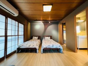 Ueno house房間的床