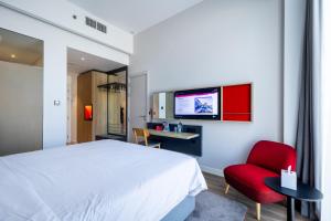 TV a/nebo společenská místnost v ubytování Ink Hotel