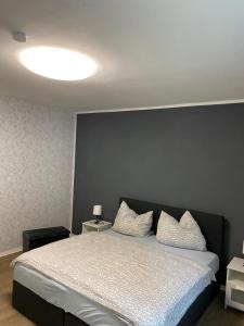 Postel nebo postele na pokoji v ubytování Ferienwohnung Da Emi + 3 fotografie