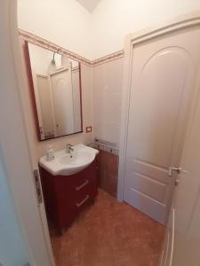 a bathroom with a sink and a mirror and a shower at domus rosada in Ripa Teatina +58 photos