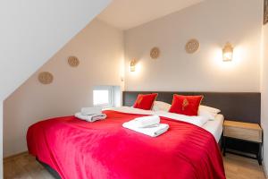 Posteľ alebo postele v izbe v ubytovaní Apartament Leśna Łąka Zakopane
