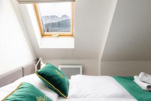 Posteľ alebo postele v izbe v ubytovaní Apartament Leśna Łąka Zakopane