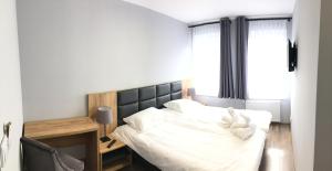 Postel nebo postele na pokoji v ubytování Jurajska Przystań + 37 fotografií