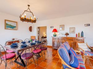 a dining room with a table and chairs at Holiday Home Josalie by Interhome in Sainte-Maxime