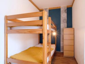 a bunk bed room with two bunk beds at Apartment Le Clos de la Fontaine-2 by Interhome in Saint-Gervais-les-Bains