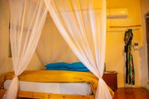 Katil atau katil-katil dalam bilik di Firefly Boutique Lodge