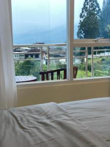Krevet ili kreveti u jedinici u objektu Algara Puncak Hotel
