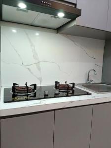 Kuhinja ili čajna kuhinja u objektu Algara Puncak Hotel