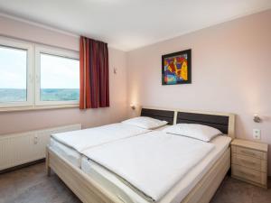 Postel nebo postele na pokoji v ubytování Apartment B1014 by Interhome
