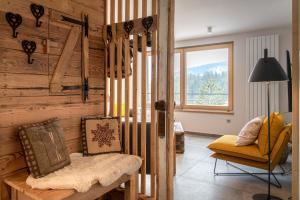 Posedenie v ubytovaní Terre de Sapins - Gîtes nature haut de gamme avec sauna au cœur du Lac Blanc