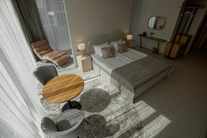 Кровать или кровати в номере Marine Residence Sea View