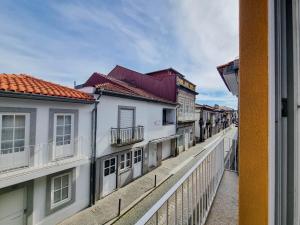 a view from a window of a street with buildings at SAM - Studio in the city center in Viana do Castelo