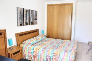 Uma cama ou camas num quarto em Varandas do Sol
