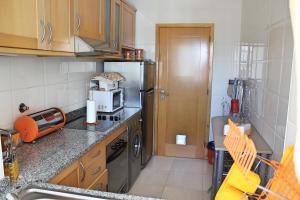 A cozinha ou kitchenette de Varandas do Sol