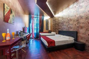 Łóżko lub łóżka w pokoju w obiekcie Hotel Relais Dei Papi