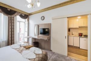 Cama ou camas em um quarto em Punto Suite