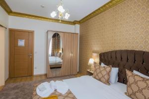 Cama ou camas em um quarto em Punto Suite