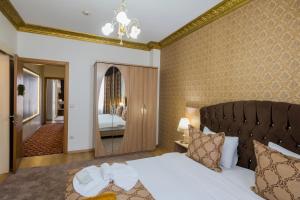 Cama ou camas em um quarto em Punto Suite