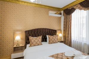 Cama ou camas em um quarto em Punto Suite