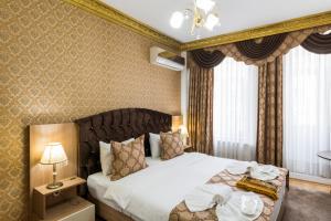 Cama ou camas em um quarto em Punto Suite